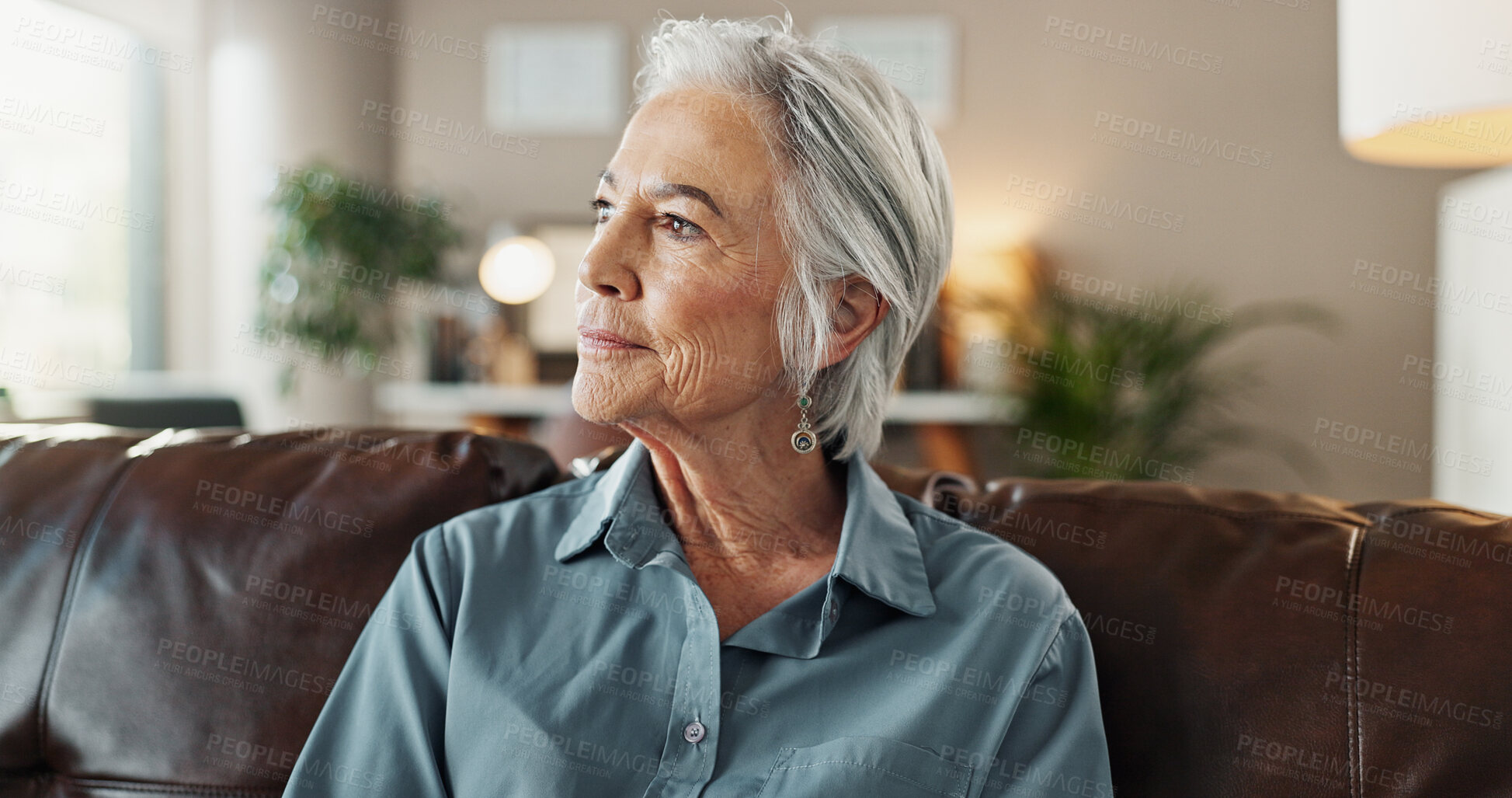 Buy stock photo Senior woman, thinking and sofa for mental health, lonely or grief in home with nostalgia in retirement. Elderly person, vision and couch for depression, anxiety and sad with past memory or wondering