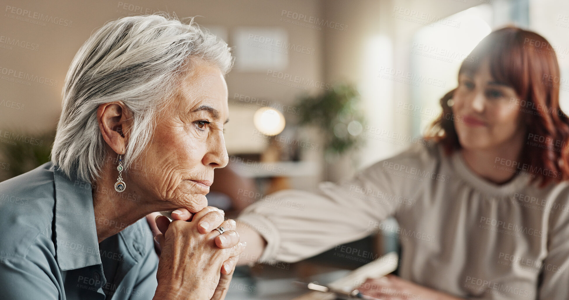 Buy stock photo Psychologist, talking and senior woman with support and mental health assessment in consultation. Sad, empathy and care with counseling, psychology and evaluation with advice in office for help
