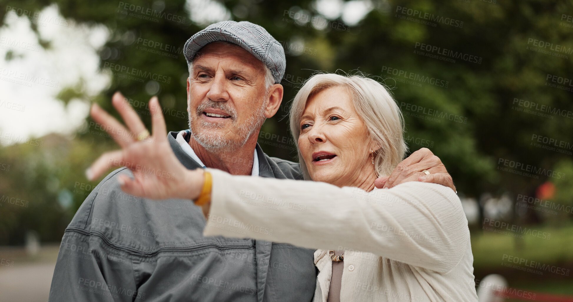 Buy stock photo Senior couple, sightseeing and travel with nature for love, bonding or outdoor memory together at park. Mature, man and woman with smile, hug or pointing for path, remember or reminder of first date