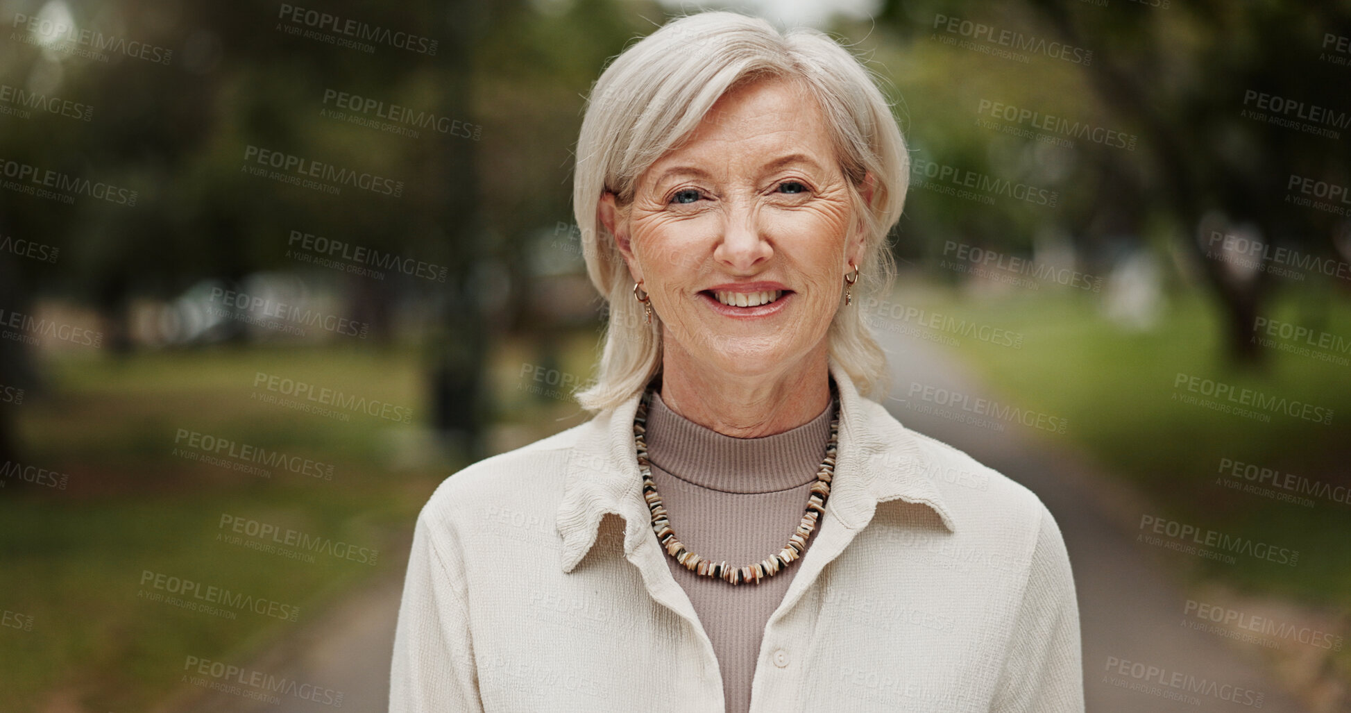 Buy stock photo Park, senior woman and smile on portrait with walk routine on break, retirement and pension in Germany. Female person, pensioner and happiness outdoor in confidence for exploring, peace and clam