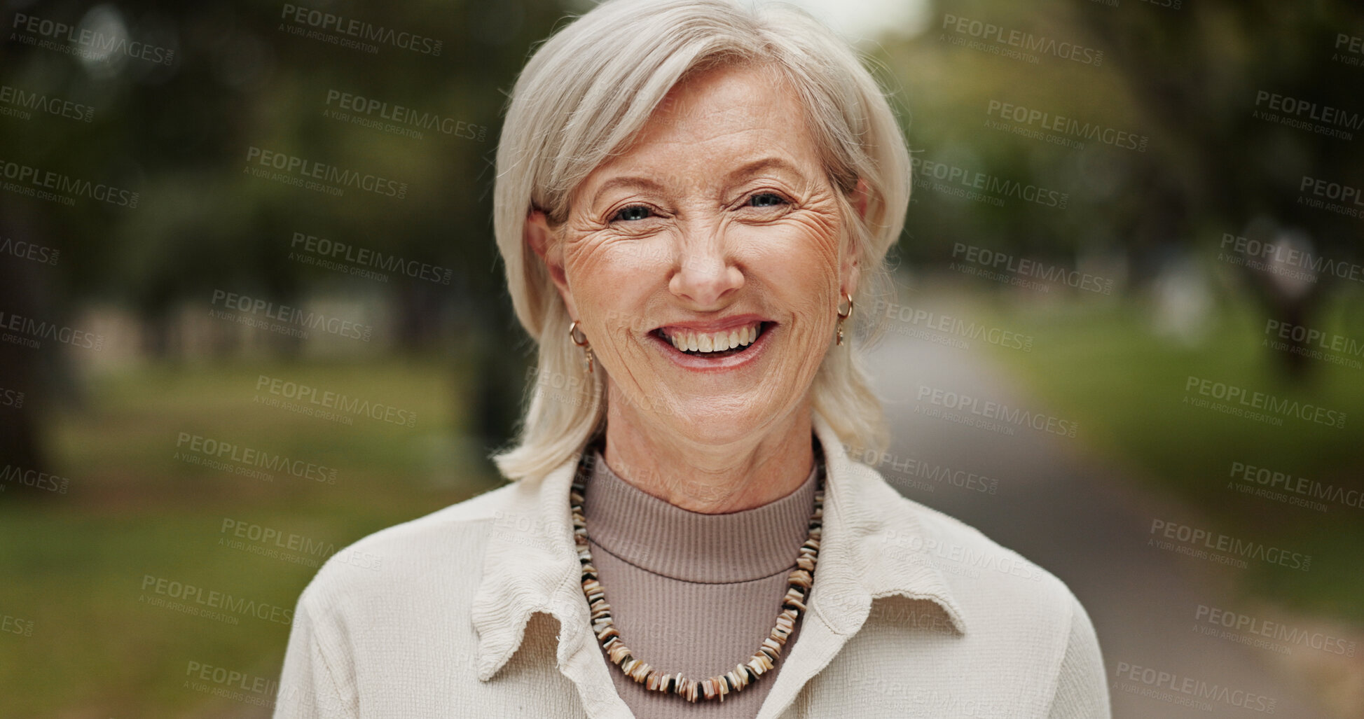 Buy stock photo Senior, woman and portrait with smile at park for retirement wellness, confidence or relax in nature. Happy person, face or walking in environment for fresh air, peaceful and travel adventure outdoor