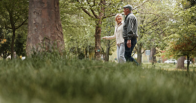 Buy stock photo Smile, love and walking with old couple in park for retirement, happiness and wellness. Support, date and romance with senior man and woman bonding in nature for partner, marriage and peace together