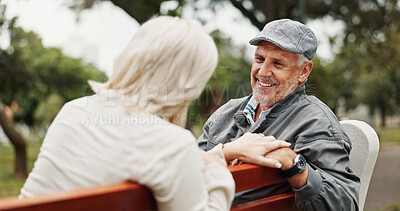 Buy stock photo Mature couple, talking and smile in park for bonding, conversation and commitment together outdoors. Retirement, marriage and elderly man and women in nature on bench for love, care and connection