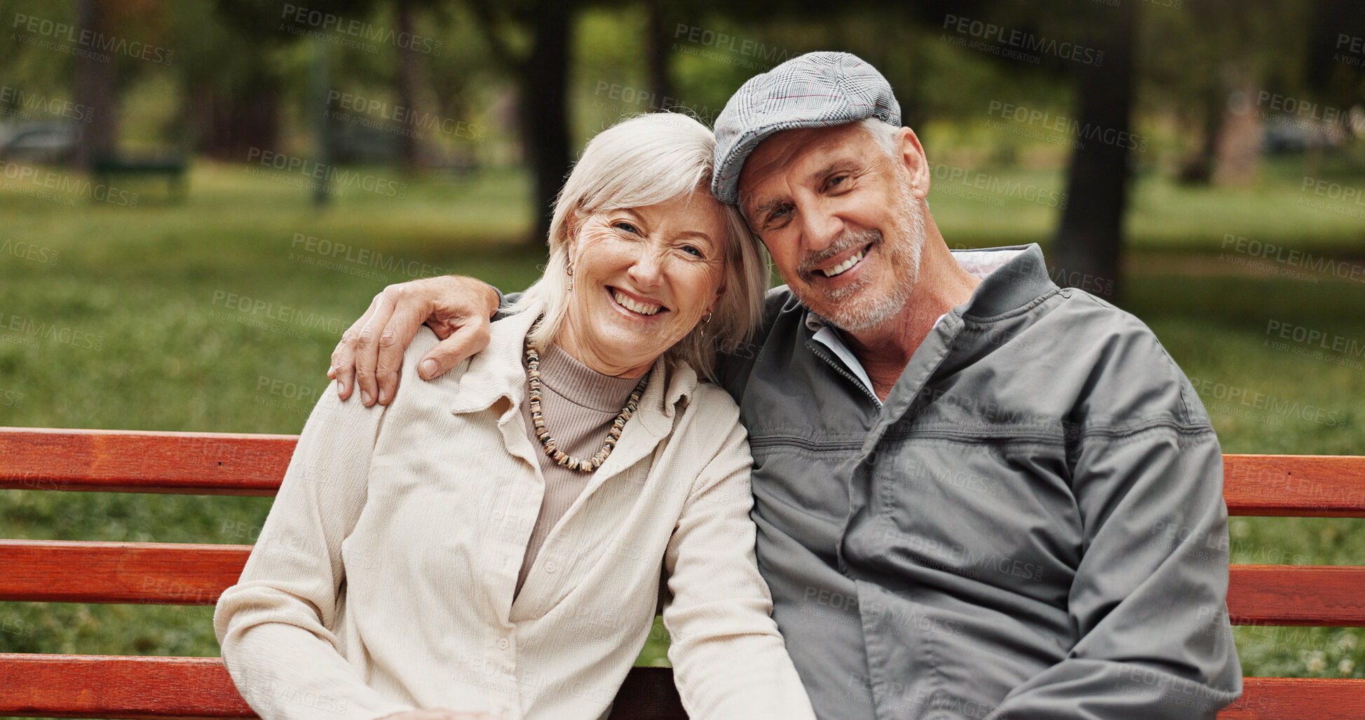 Buy stock photo Mature couple, hug and portrait in park for bonding, conversation and commitment together outdoors. Retirement, marriage and elderly man and women in nature on bench for love, care and connection