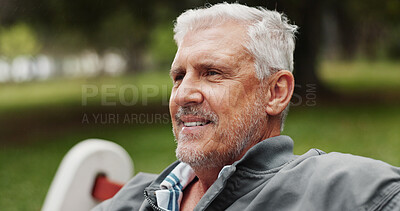 Buy stock photo Mature man, thinking and outdoor for happiness, reflection and memory with nostalgia in park. Male person, smile and relax for break or peace in nature for calm, environment and fresh air on weekend
