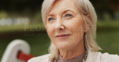 Buy stock photo Mature woman, thinking and outdoor in park for memory, reflection and nostalgia with happiness. Female person, smile and relax on break or rest in nature for calm, environment or fresh air on weekend