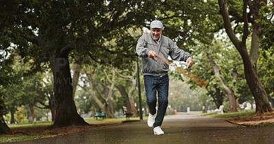 Buy stock photo Dance, success and walking stick with old man in park for winner, announcement and freedom. Achievement, energy and excited with senior person and celebration for retirement, good news or confidence 