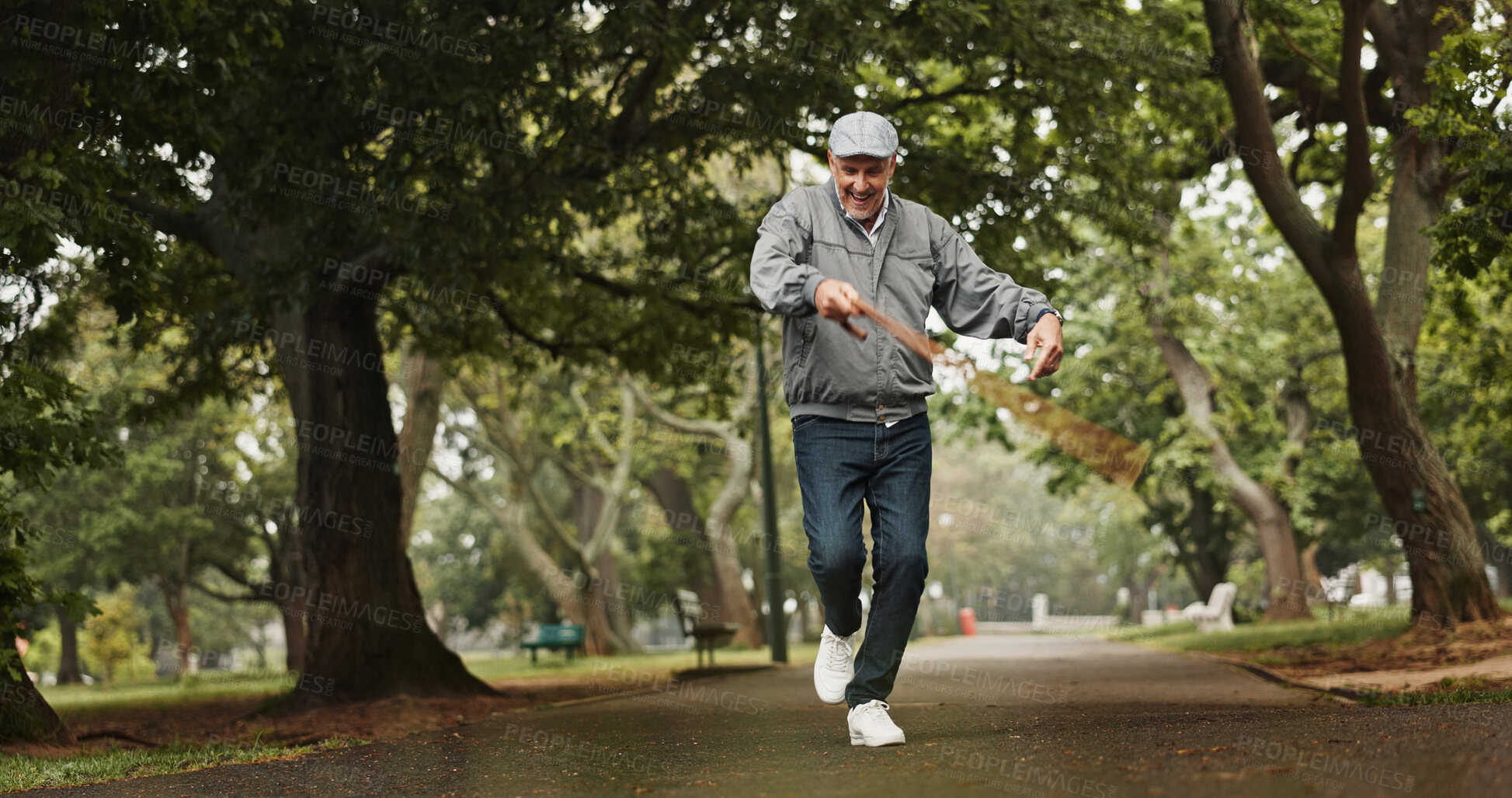 Buy stock photo Dance, success and walking stick with old man in park for winner, announcement and freedom. Achievement, energy and excited with senior person and celebration for retirement, good news or confidence 