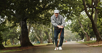 Buy stock photo Elderly man, walking stick and dance in park with energy, happiness and excited for good news. Senior person with disability, cane and movement on nature path for retirement freedom with announcement