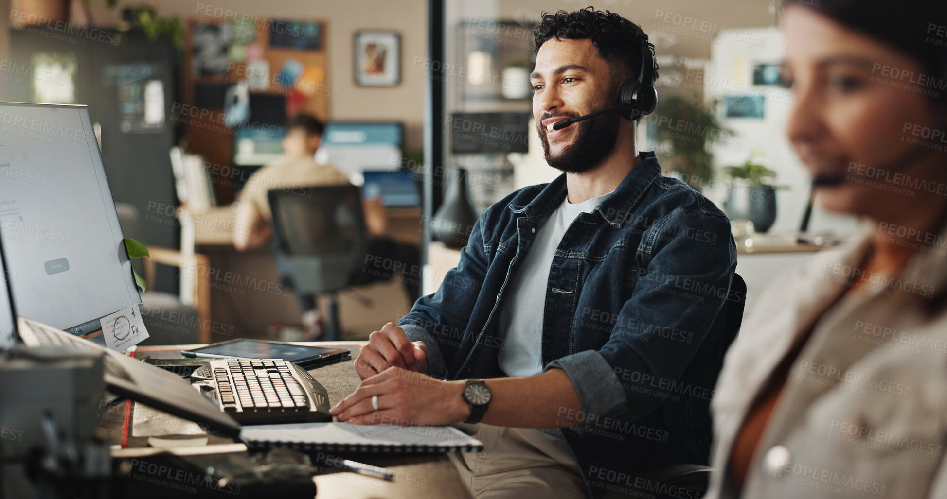 Buy stock photo Headset, technical support and man in coworking office with help, online advice and website management. Virtual assistant, customer service and happy IT consultant at computer with smile at agency
