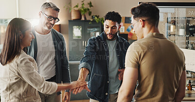 Buy stock photo Diversity, group of people and team building in office for collaboration, brainstorming and planning. Hands together, discussion and meeting for motivation, employee engagement and problem solving