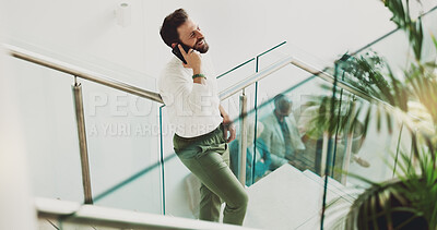 Buy stock photo Phone call, smile and stairs with business man in office for communication, conversation or project update. Break, discussion and negotiation with happy employee on steps in workplace from above