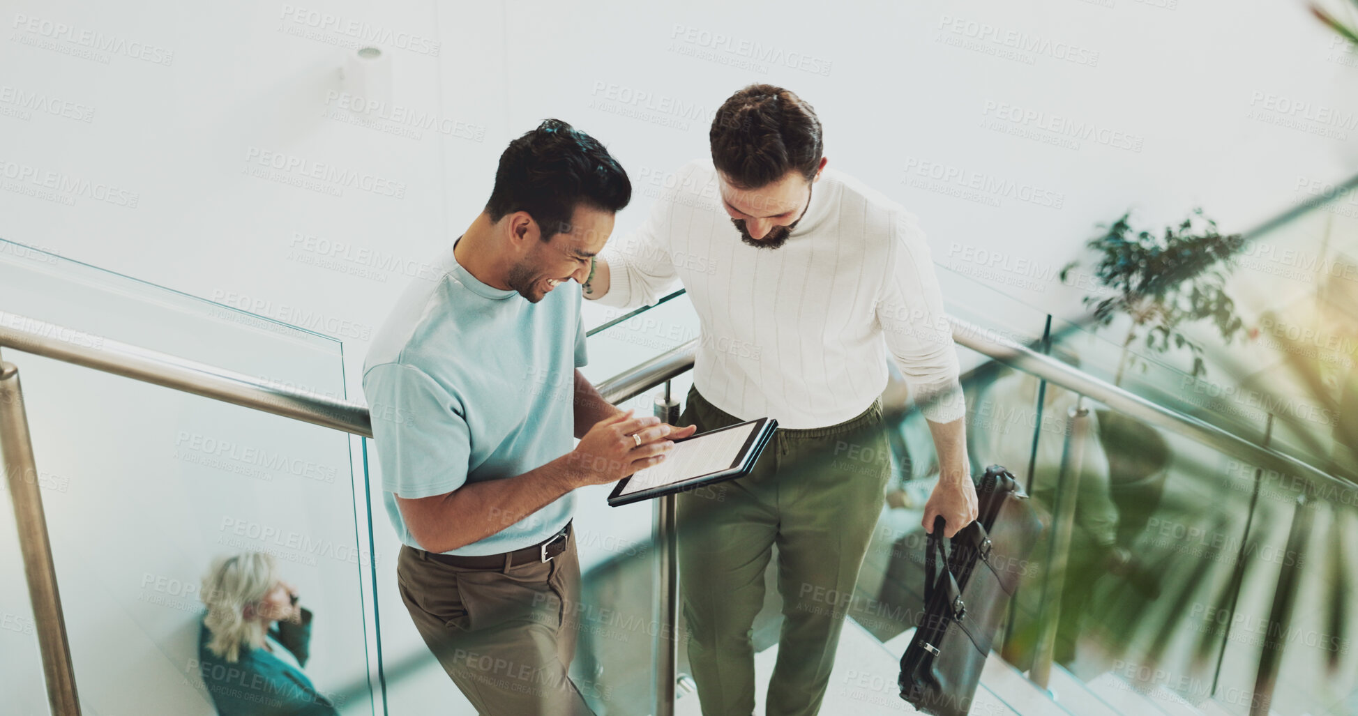 Buy stock photo People, tablet screen and meeting in lobby for business, agenda and positive feedback on stairs. Above, tech and admin team in office for planning, schedule update and happy for company development