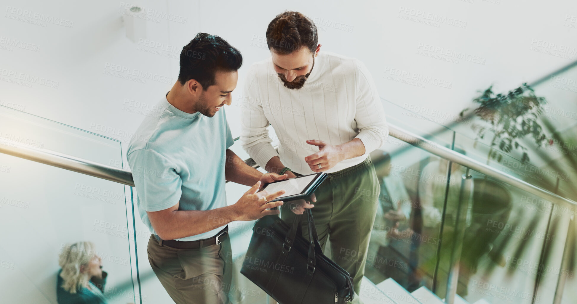 Buy stock photo People, tablet and meeting in lobby for business, agenda and positive feedback on screen. Above, tech and admin team on office stairs for planning, schedule update and happy for company development