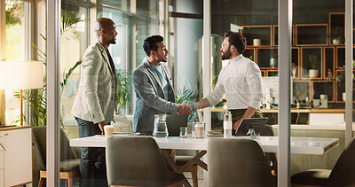 Buy stock photo Handshake, meeting and business people with partnership in office boardroom together with thank you. Deal, team and men shaking hands for welcome with client in corporate workplace for agreement.