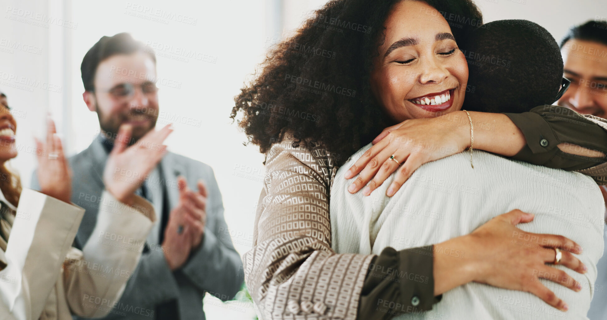 Buy stock photo Applause, hugging and success with business people in office for celebration or congratulations of promotion. Embrace, goals and target with employee group clapping in workplace for achievement