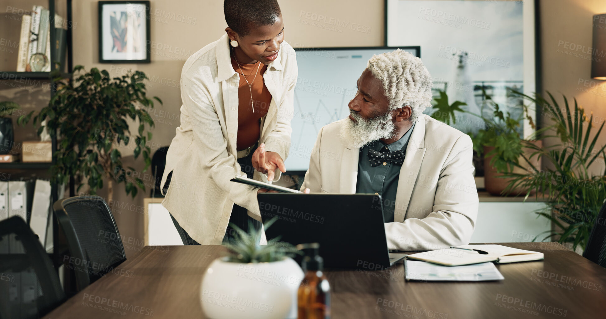 Buy stock photo Business, feedback or question with black woman and mentor in office for advice or assistance. Asking, laptop and tablet with employee talking to experienced manager in workplace for help or report
