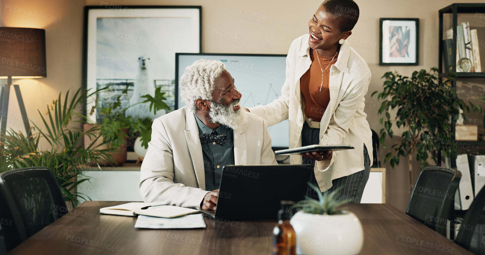 Buy stock photo Business, feedback or technology with black woman and manager in office for advice or assistance. Conversation, laptop and tablet with happy illustrator talking to mentor in workplace for help