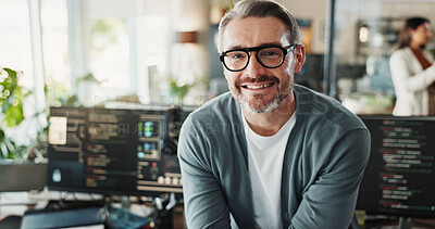 Buy stock photo Man, engineer and glasses in office for portrait, web programming and software development on screen. Mature programmer, happy and tech in agency for cybersecurity, coding or smile for startup growth