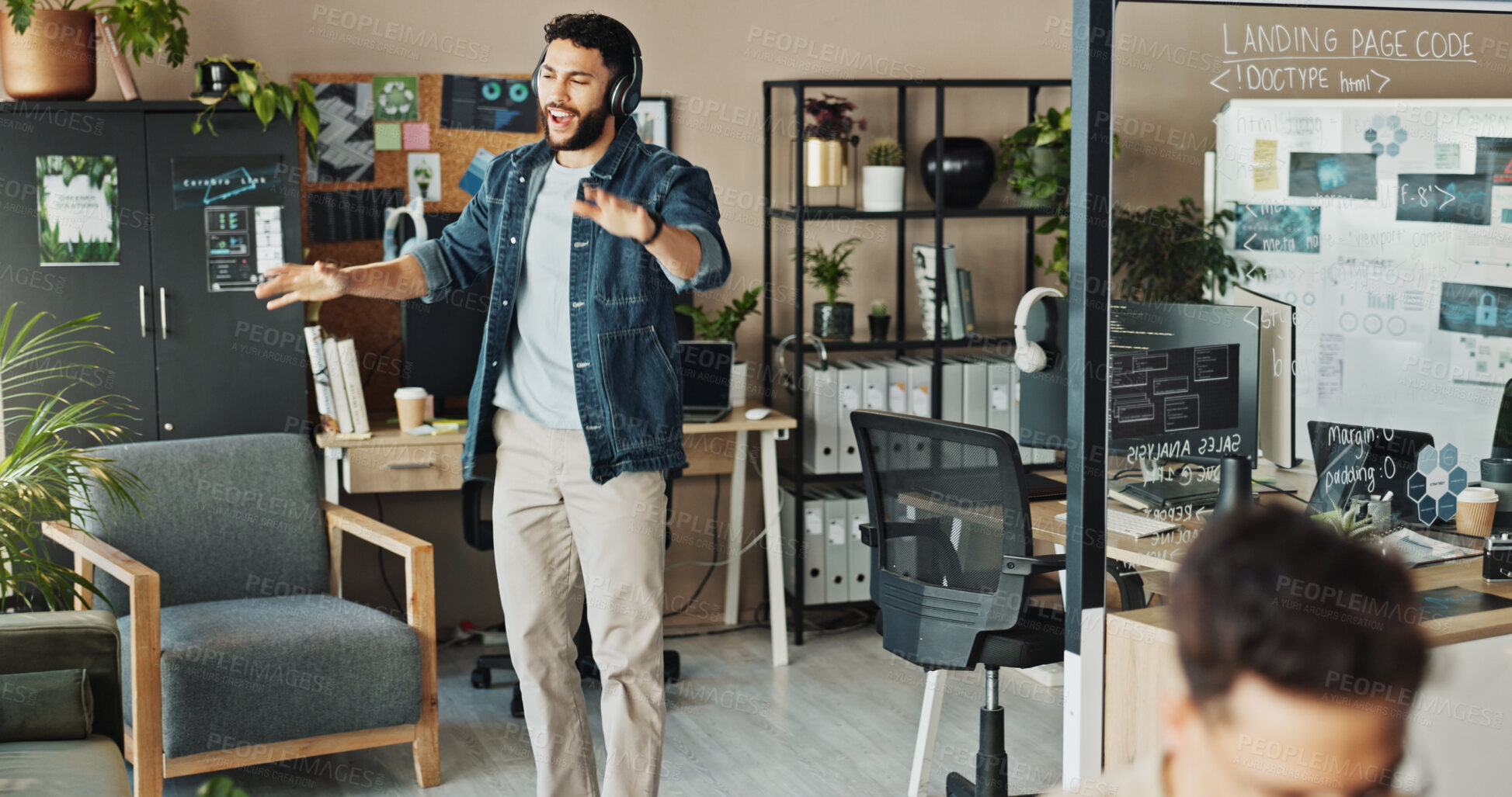 Buy stock photo Programmer, headphones and man dance to music to celebrate software project success. Business, radio or employee listening to audio, sound and excited engineer singing song at creative startup office