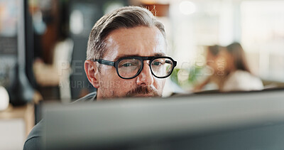 Buy stock photo Glasses, reading and computer with business man in office for planning, thinking or company newsletter. Website designer, vision and online with mature person in creative startup for proposal idea