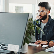 Computer engineering, programming and web development with man in ...
