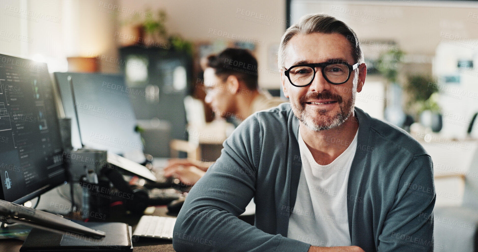 Buy stock photo Man, coder and glasses in office for portrait, website development and software engineering at tech. Mature programmer, smile and pride in agency for cybersecurity, programming and coding startup