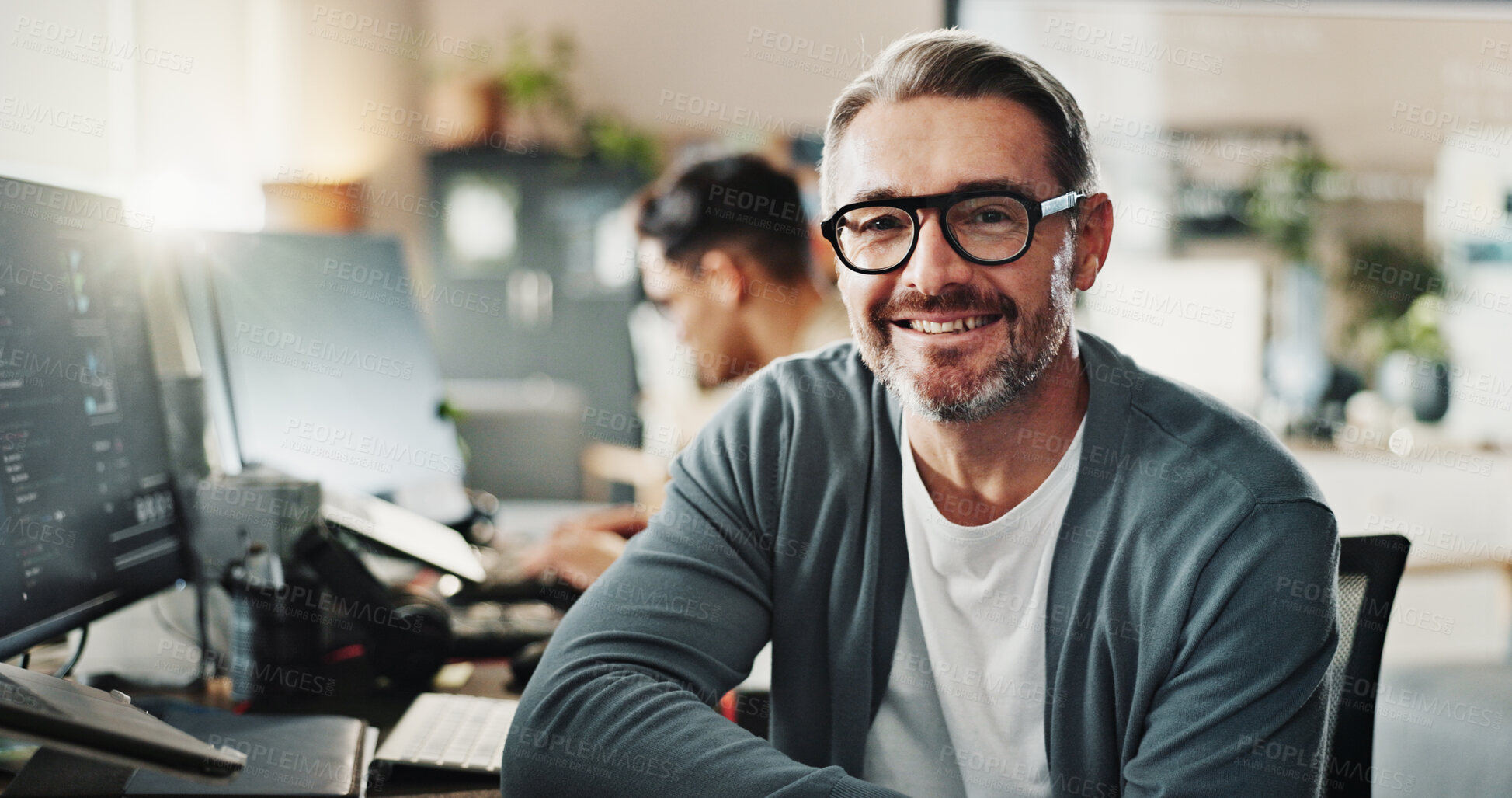 Buy stock photo Happy man, programmer and glasses in office for portrait, website development or software engineering at tech. Mature IT guy, smile or pride in agency for cybersecurity, programming or coding startup