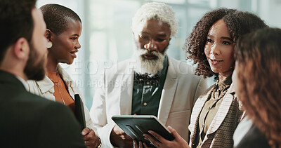 Buy stock photo Business, man and leader with tablet in meeting for report, feedback or reviews on property development. Employees, diversity and people at office for teamwork or collaboration on real estate project