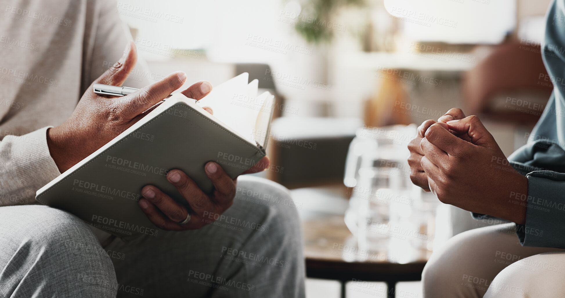 Buy stock photo Psychology, patient hands and therapist with book for consulation, therapy and anxiety. Psychologist, notes and woman with depression for advice, grief counseling and trust in practice with support