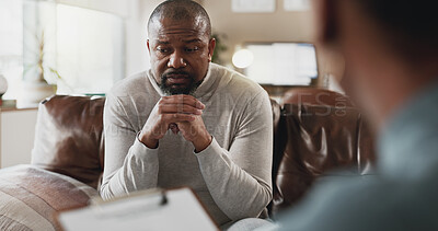 Buy stock photo African man, sad and psychologist in office with thinking, clipboard and trauma counselling at clinic. People, therapy and mental health with support for assessment with notes, depression or anxiety