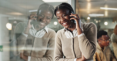 Buy stock photo Woman, phone call and smile by window, office and chat at night with reflection, contact or networking at company. African person, happy and smartphone for deal, overtime or talk at creative agency