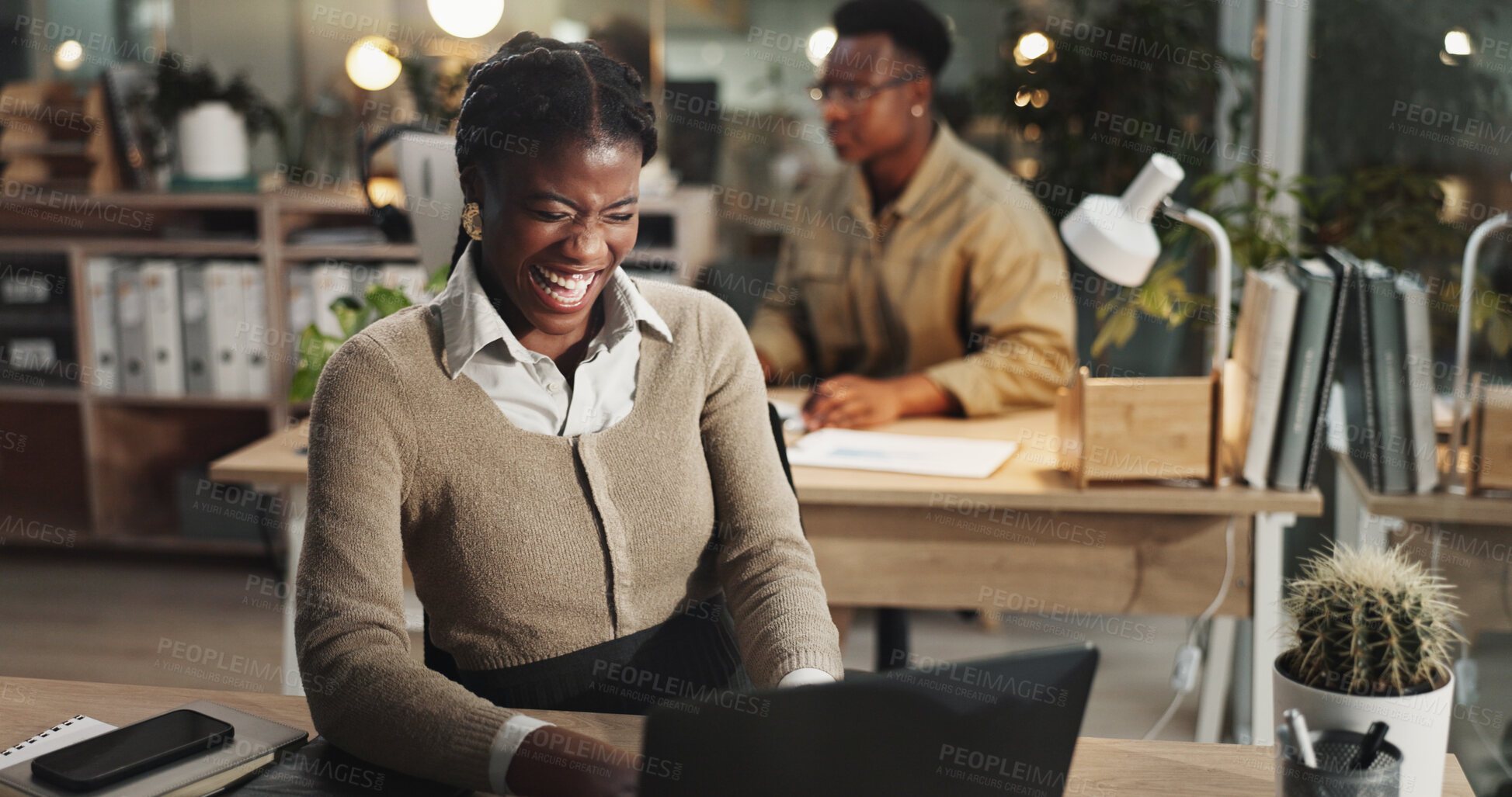 Buy stock photo Black woman, laptop and funny communication in office, email client and online to update website. Female person, journalist and laughing for joke in column at workplace, night and humor in article