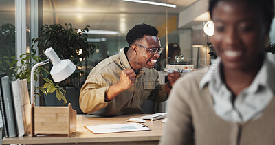 Buy stock photo Excited, black man or night with celebration for winning, promotion or offer at office desk. Happy African, male person or winner with smile on computer for victory, good news or success at workplace