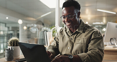 Buy stock photo Black man, office and laptop with typing, research and happiness in working late at night on project. Male person, technology and concentration as web designer in digital agency for online navigation