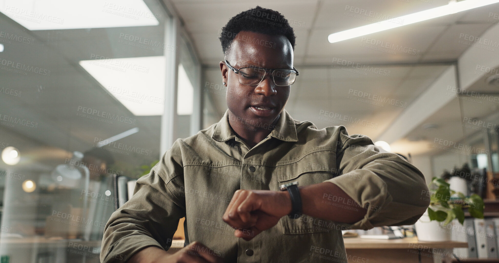 Buy stock photo Black man, stress or watch in office for deadline, time management or anxiety for online meeting with POV. Accountant, frustrated or late in workplace with crisis, worry or missed virtual appointment