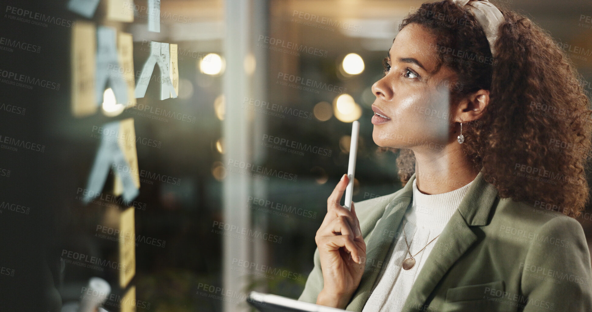 Buy stock photo Night, woman or sticky notes on window for thinking, task reminders or brainstorming with tablet. Business, admin person or tech in office for schedule planning, problem solving or moodboard on glass