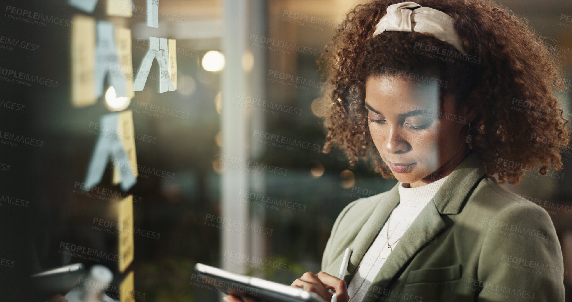 Buy stock photo Night, woman and tablet at glass for planning, deadline task and brainstorming with sticky notes. Business, admin person and tech in dark office for schedule, problem solving and moodboard on window