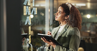 Buy stock photo Night, woman and tablet at glass for thinking, deadline task and brainstorming with sticky notes. Business, admin person and tech in dark office for schedule, problem solving and moodboard on window