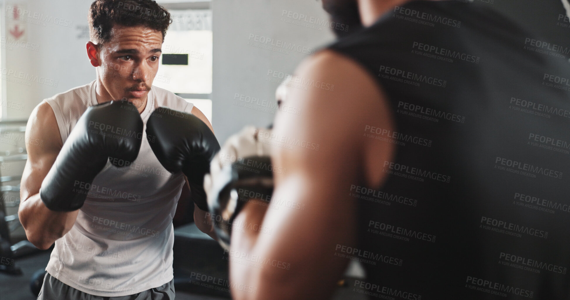 Buy stock photo Boxer, man and personal trainer in gym with workout, power and training for sport and strength in wellness club. Coach, health and sweating athlete and boxing with exercise for fight and match