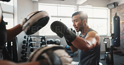Buy stock photo Boxing, man and personal trainer in fitness gym with workout, power and training for sport and strength in club. Coach, health and sweating athlete and boxer with exercise for fight and match