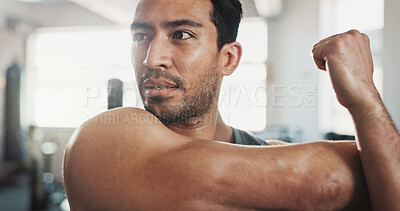Buy stock photo Gym, asian man and arms with stretching for fitness, flexibility and wellness for muscle tension. Thinking, male person and bodybuilder with warm up for exercise, workout session and prepare in club