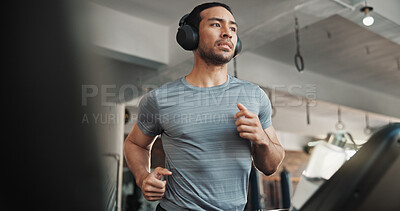 Buy stock photo Man, headphones and workout on treadmill at gym for running, training and cardio exercise. Fitness, athlete and listening to music or radio app on machine for marathon endurance and speed challenge