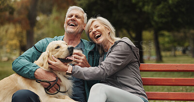 Buy stock photo Dog, park and old couple on bench, funny and conversation with animal lover. Outdoor, pet and happy senior man with mature woman, bonding together and relationship with break, laughing and retirement