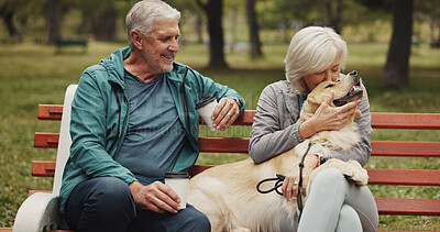 Buy stock photo Dog, park and old couple on bench, hug and relationship with animal lover. Outdoor, pet and happy senior man with mature woman, bonding together and conversation with embrace, smile and retirement