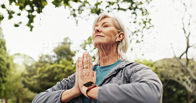 Buy stock photo Hands, meditation and mature woman in park for outdoor peace, calm and spiritual healing. Namaste, mindfulness and low angle of senior person in nature, wellness and healthy mindset in retirement