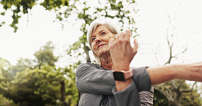 Buy stock photo Mature, woman and stretching arms in park, low angle of warm up for fitness, health and thinking for wellness outdoor. Exercise, workout and prepare for start of training with self care thoughts