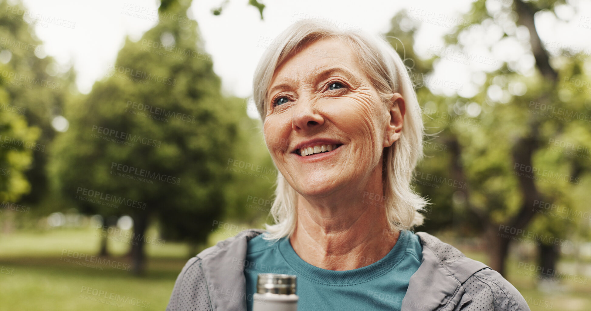 Buy stock photo Outdoor, park and mature woman with thinking, smile and calm from exercise and fitness with bottle. Nature, happy and wellness with drink, training and workout for health in the morning on weekend