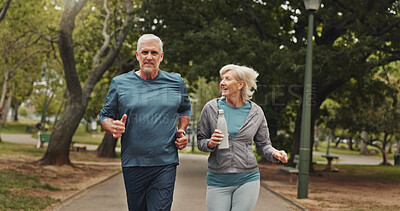 Buy stock photo Senior couple, running and fitness in park for conversation with speed, steps and bottle for hydration. People, man and woman with talk, partner and exercise in nature, path and training in Germany