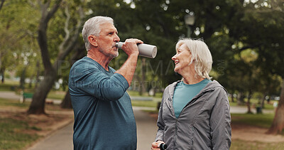 Buy stock photo Outdoor, park and mature couple with drinking water, marriage and calm from exercise and fitness. Nature, happy and people with love, training and workout for health in the morning on weekend